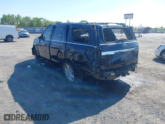2021 Ford Expedition XLT with VIN 1FMJU1HT1MEA60855, listed as a IAAI auction lot 41962157 with 100,178 mi miles and . Bid and sale history available at DreamBid. Image 3.
