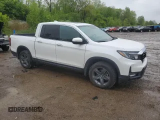 2023 Honda Ridgeline RTL-E with VIN 5FPYK3F78PB015187, listed as a Copart auction lot 57655465 with 57,704 mi miles and Salvage title. Bid and sale history available at DreamBid. Image 4.