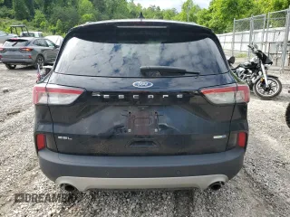 2020 Ford Escape SEL with VIN 1FMCU9H68LUB17865, listed as a Copart auction lot 58217685 with 113,569 mi miles and Salvage title. Bid and sale history available at DreamBid. Image 6.