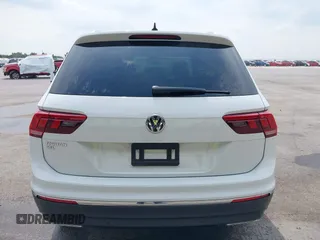 2020 Volkswagen Tiguan SE z VIN 3VV3B7AX4LM032609, wystawiony jako IAAI lot #42074359 z przebiegiem 52 404 mil mil oraz . Historia ofert i sprzedaży dostępna na DreamBid. Obrazek 16.