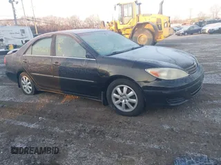 2002 Toyota Camry XLE z VIN JTDBF30K620017012, wystawiony jako IAAI lot #41372822 z przebiegiem Nie podano mil oraz . Historia ofert i sprzedaży dostępna na DreamBid. Obrazek 1.