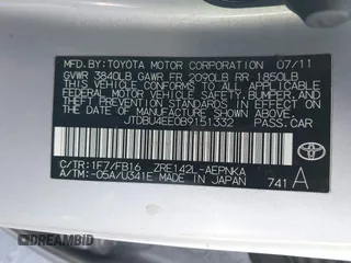 2011 Toyota Corolla L with VIN JTDBU4EE0B9151332, listed as a IAAI auction lot 41970433 with 113,157 mi miles. Bid and sale history available at carsss.com. Image 9.