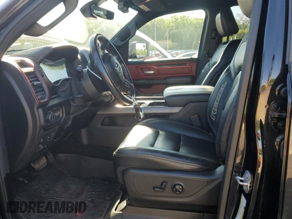 2019 Ram 1500 Rebel z VIN 1C6SRFLT5KN811457, wystawiony jako Copart lot #57034285 z przebiegiem 84 077 mil mil oraz Szkoda całkowita • Salvage title. Historia ofert i sprzedaży dostępna na DreamBid. Obrazek 7.
