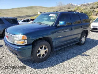 2005 GMC Yukon Denali z VIN 1GKEK63U85J147836, wystawiony jako Copart lot #55319605 z przebiegiem 196 599 mil mil oraz Czysty tytuł • Clean title. Historia ofert i sprzedaży dostępna na DreamBid. Obrazek 1.
