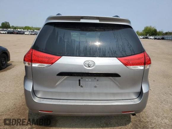 2014 Toyota Sienna L with VIN 5TDZK3DC8ES442973, listed as a Copart auction lot 59660055 with 310,496 mi miles and Salvage title. Bid and sale history available at DreamBid. Image 6.