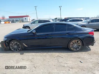 2019 BMW 5 Series M550i xDrive with VIN WBAJB9C51KB288853, listed as a IAAI auction lot 41905019 with Not provided miles and . Bid and sale history available at DreamBid. Image 14.