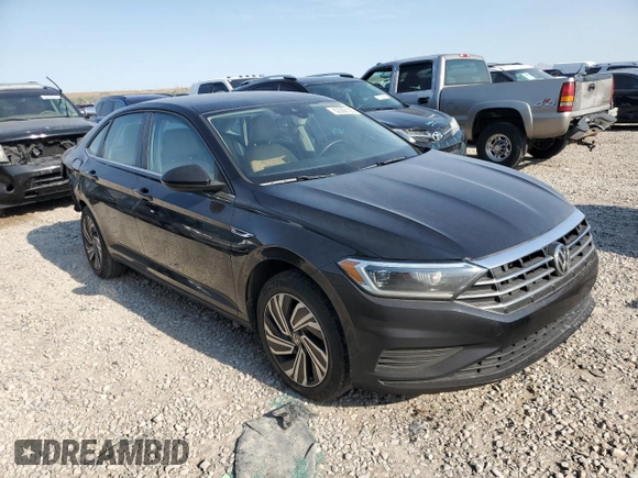 2021 Volkswagen Jetta SEL z VIN 3VWE57BU5MM013374, wystawiony jako Copart lot #62359125 z przebiegiem 50 969 mil mil oraz Czysty tytuł • Clean title. Historia ofert i sprzedaży dostępna na DreamBid. Obrazek 4.