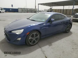 2016 Scion FR-S z VIN JF1ZNAA15G9702106, wystawiony jako Copart lot #52070575 z przebiegiem 77 221 mil mil oraz Czysty tytuł • Clean title. Historia ofert i sprzedaży dostępna na DreamBid. Obrazek 1.