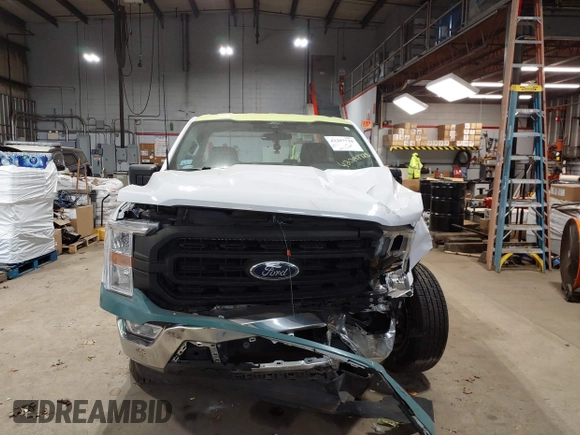 2021 Ford F-150 XL with VIN 1FTMF1CB6MKF13315, listed as a IAAI auction lot 42297728 with 74,450 mi miles and . Bid and sale history available at DreamBid. Image 13.