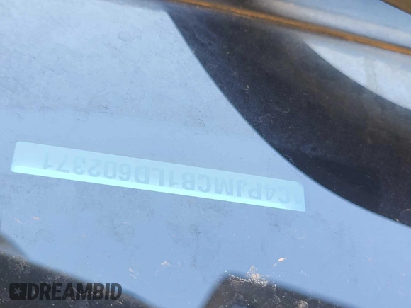 2020 Jeep Cherokee Latitude with VIN 1C4PJMCB1LD602371, listed as a IAAI auction lot 42806971 with 81,291 mi miles and . Bid and sale history available at DreamBid. Image 2.