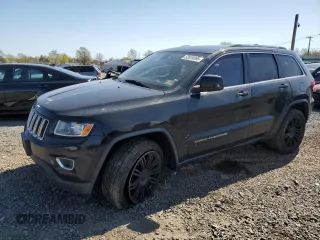 2014 Jeep Grand Cherokee Laredo with VIN 1C4RJFAG4EC210321, listed as a Copart auction lot 53574595 with 119,650 mi miles and Salvage Title. Bid and sale history available at DreamBid. Image 1.