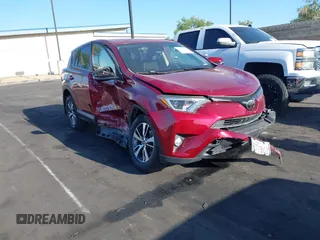 2018 Toyota RAV4 XLE with VIN JTMWFREV6JD117500, listed as a IAAI auction lot 42258588 with Not provided miles and . Bid and sale history available at DreamBid. Image 1.