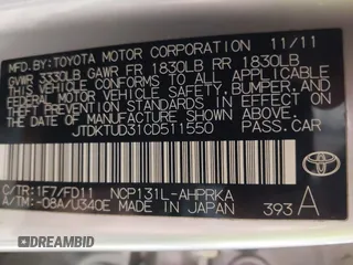 2012 Toyota Yaris L with VIN JTDKTUD31CD511550, listed as a IAAI auction lot 42157934 with 131,183 mi miles. Bid and sale history available at carsss.com. Image 9.