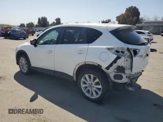 2014 Mazda CX-5 Grand Touring with VIN JM3KE4DY2E0360208, listed as a Copart auction lot 52037885 with 118,306 mi miles and Salvage Title. Bid and sale history available at carsss.com. Image 2.