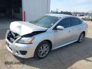 2015 Nissan Sentra SR with VIN 3N1AB7AP2FY251476, listed as a IAAI auction lot 42060323 with 114,474 mi miles and . Bid and sale history available at DreamBid. Image 2.