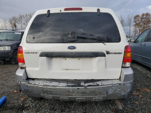 2005 Ford Escape Hybrid with VIN 1FMCU95H95KC74177, listed as a Copart auction lot 77361724 with 195,199 mi miles and Salvage Title. Bid and sale history available at carsss.com. Image 6.
