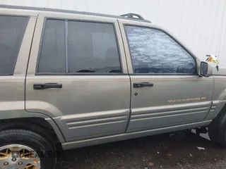 1998 Jeep Grand Cherokee Limited with VIN 1J4GZ78YXWC236969, listed as a IAAI auction lot 41095686 with 182,001 mi miles. Bid and sale history available at carsss.com. Image 14.