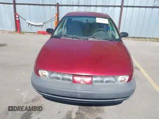 1996 Saturn SL with VIN 1G8ZG5289TZ214790, listed as a IAAI auction lot 42090262 with 197,485 mi miles. Bid and sale history available at carsss.com. Image 6.