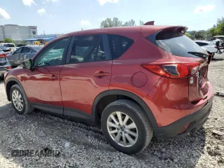 2013 Mazda CX-5 Touring with VIN JM3KE4CE5D0164060, listed as a Copart auction lot 57113875 with 83,262 mi miles and Salvage Title. Bid and sale history available at DreamBid. Image 2.