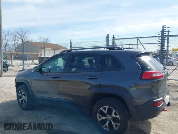 2015 Jeep Cherokee Trailhawk z VIN 1C4PJMBS3FW520328, wystawiony jako IAAI lot #41746017 z przebiegiem 83 485 mil mil oraz . Historia ofert i sprzedaży dostępna na DreamBid. Obrazek 15.