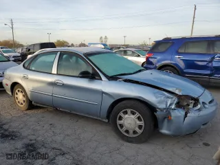 1997 Ford Taurus G with VIN 1FALP51U8VA192556, listed as a Copart auction lot 77604464 with 114,830 mi miles and Salvage Title. Bid and sale history available at carsss.com. Image 4.