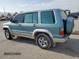 2002 Isuzu Trooper S z VIN JACDJ58X627J08662, wystawiony jako Copart lot #58969555 z przebiegiem 219 492 mil mil oraz Tytuł czysty. Historia ofert i sprzedaży dostępna na DreamBid. Obrazek 2.