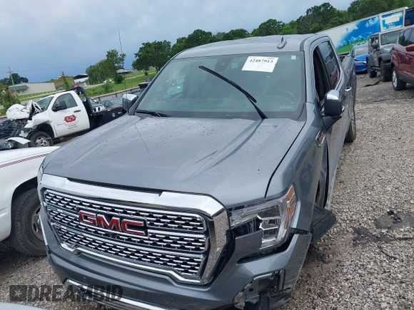 2019 GMC Sierra 1500 Denali with VIN 1GTU9FEL7KZ355632, listed as a IAAI auction lot 42487913 with 51,467 mi miles and . Bid and sale history available at DreamBid. Image 13.