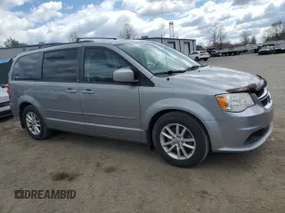 2014 Dodge Grand Caravan SXT with VIN 2C4RDGCG7ER141867, listed as a Copart auction lot 53187715 with 231,414 mi miles and Clean Title. Bid and sale history available at DreamBid. Image 4.