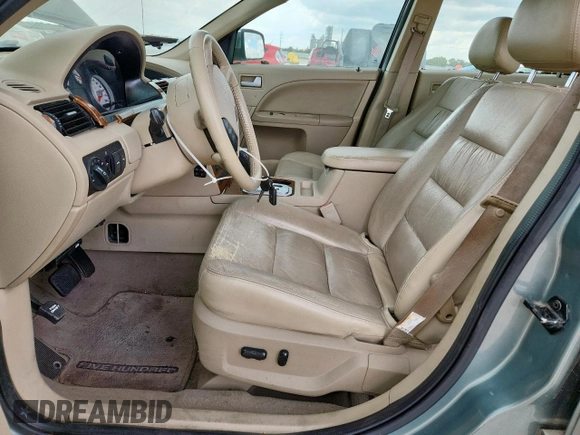 2007 Ford Five Hundred Limited z VIN 1FAHP25117G143252, wystawiony jako Copart lot #62322425 z przebiegiem 118 717 mil mil oraz Czysty tytuł • Clean title. Historia ofert i sprzedaży dostępna na DreamBid. Obrazek 7.