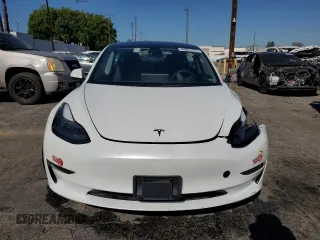2023 Tesla Model 3 with VIN 5YJ3E1EA7PF450343, listed as a Copart auction lot 52446595 with 36,137 mi miles and Salvage Title. Bid and sale history available at DreamBid. Image 5.