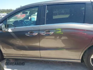 2020 Honda Odyssey Touring with VIN 5FNRL6H87LB002202, listed as a IAAI auction lot 42015741 with 182,051 mi miles and . Bid and sale history available at DreamBid. Image 14.