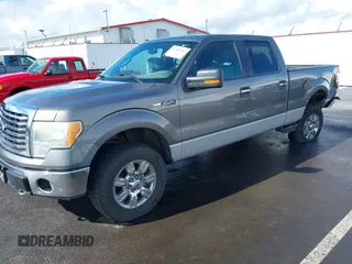 2011 Ford F-150 XL with VIN 1FTFW1EF1BFB58262, listed as a IAAI auction lot 41788963 with 157,328 mi miles. Bid and sale history available at carsss.com. Image 2.