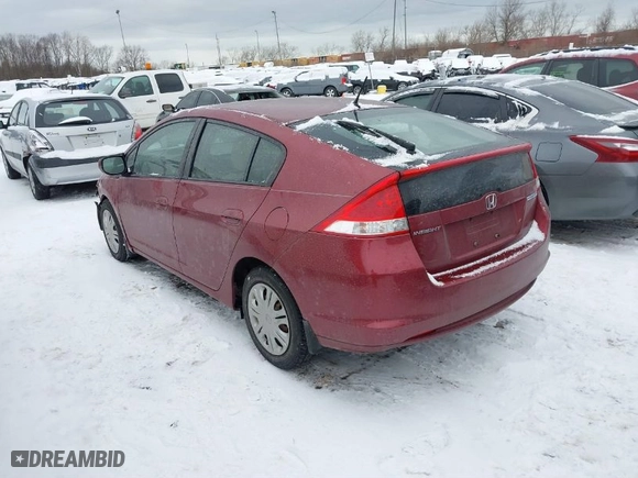 2010 Honda Insight LX with VIN JHMZE2H51AS004907, listed as a IAAI auction lot 41259182 with 76,494 mi miles. Bid and sale history available at carsss.com. Image 3.