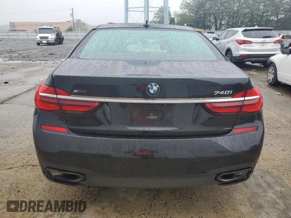 2019 BMW 7 Series 740i xDrive z VIN WBA7E4C52KGV28841, wystawiony jako Copart lot #56567375 z przebiegiem 162 220 mil mil oraz Szkoda całkowita • Salvage title. Historia ofert i sprzedaży dostępna na DreamBid. Obrazek 6.