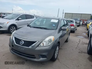 2012 Nissan Versa SL with VIN 3N1CN7AP3CL892631, listed as a IAAI auction lot 41910292 with 148,442 mi miles. Bid and sale history available at carsss.com. Image 2.