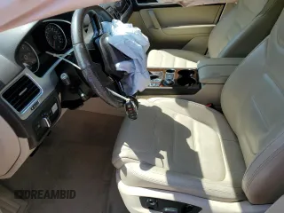 2015 Volkswagen Touareg Lux z VIN WVGEP9BP2FD006802, wystawiony jako Copart lot #52291965 z przebiegiem 122 787 mil mil oraz Szkoda całkowita • Salvage title. Historia ofert i sprzedaży dostępna na DreamBid. Obrazek 7.