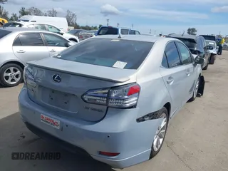 2010 Lexus HS 250h with VIN JTHBB1BA6A2013077, listed as a IAAI auction lot 41932312 with 431,799 mi miles and . Bid and sale history available at DreamBid. Image 4.