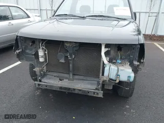 2000 Nissan Frontier 2WD XE with VIN 1N6DD21S5YC399416, listed as a IAAI auction lot 41573002 with 158,198 mi miles. Bid and sale history available at carsss.com. Image 6.