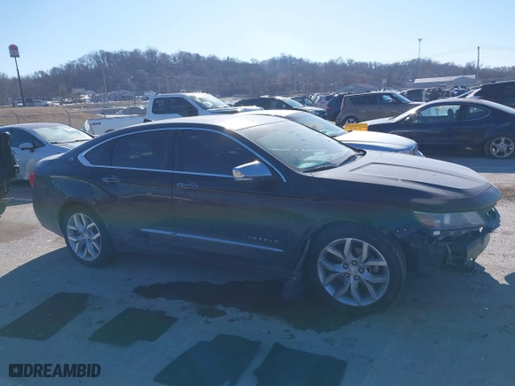 2014 Chevrolet Impala LTZ with VIN 2G1155S31E9105694, listed as a IAAI auction lot 41414595 with 128,828 mi miles. Bid and sale history available at carsss.com. Image 14.