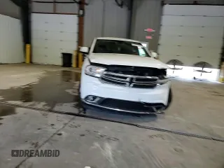 2016 Dodge Durango SXT with VIN 1C4RDJAG7GC460343, listed as a Copart auction lot 60974975 with 59,783 mi miles and Salvage title. Bid and sale history available at DreamBid. Image 14.
