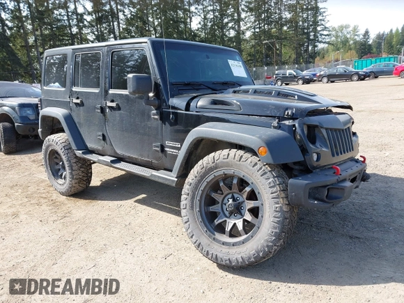 2015 Jeep Wrangler Unlimited Willys Wheeler with VIN 1C4BJWDG9FL750049, listed as a IAAI auction lot 42136188 with 115,328 mi miles and . Bid and sale history available at DreamBid. Image 1.