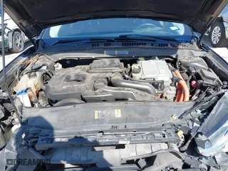 2014 Ford Fusion Titanium Hybrid with VIN 3FA6P0RU9ER111834, listed as a IAAI auction lot 41570337 with 121,099 mi miles. Bid and sale history available at carsss.com. Image 10.