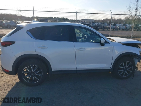 2018 Mazda CX-5 S Premium with VIN JM3KFBDM8J1419006, listed as a IAAI auction lot 41498658 with 123,622 mi miles and . Bid and sale history available at DreamBid. Image 14.