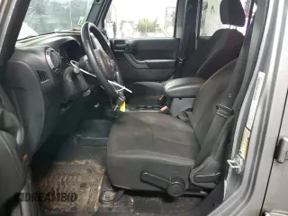 2014 Jeep Wrangler Unlimited Sport with VIN 1C4BJWDG9EL140263, listed as a Copart auction lot 47652785 with 39,493 mi miles and Salvage Title. Bid and sale history available at DreamBid. Image 7.