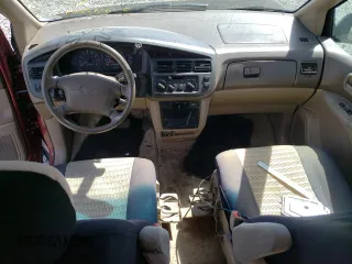 2000 Toyota Sienna LE z VIN 4T3ZF13C5YU247698, wystawiony jako Copart lot #53968755 z przebiegiem Nie podano mil oraz Szkoda całkowita • Salvage title. Historia ofert i sprzedaży dostępna na DreamBid. Obrazek 8.