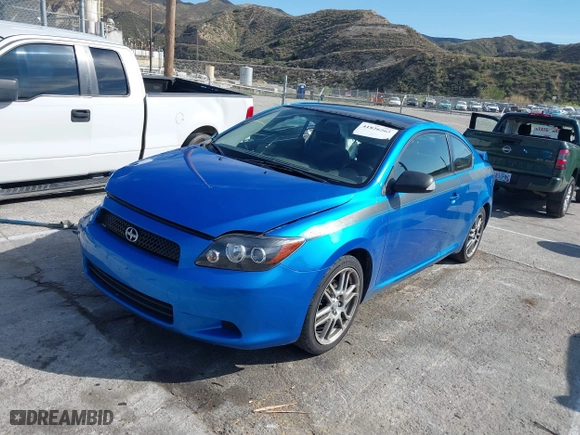 2010 Scion tC with VIN JTKDE3B79A0315713, listed as a IAAI auction lot 41826265 with 123,428 mi miles. Bid and sale history available at carsss.com. Image 19.