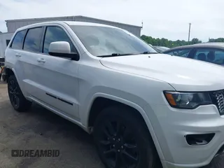 2022 Jeep Grand Cherokee Laredo X with VIN 1C4RJEAG9NC128112, listed as a IAAI auction lot 42234872 with 88,609 mi miles and . Bid and sale history available at DreamBid. Image 1.