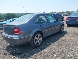 2004 Volkswagen Jetta GL with VIN 3VWRR69M04M128597, listed as a IAAI auction lot 42657556 with 283,728 mi miles and . Bid and sale history available at DreamBid. Image 4.