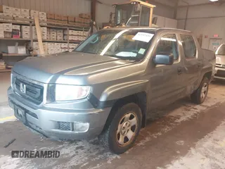 2009 Honda Ridgeline RT with VIN 5FPYK16279B104907, listed as a IAAI auction lot 42197433 with 244,260 mi miles. Bid and sale history available at carsss.com. Image 2.