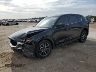 2021 Mazda CX-5 Sport with VIN JM3KFABM9M0301909, listed as a Copart auction lot 52188175 with 73,607 mi miles and Non Repairable. Bid and sale history available at carsss.com. Image 1.